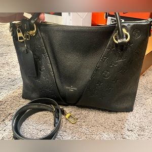 Authentic Louis Vuitton V tote MM.. discontinued
